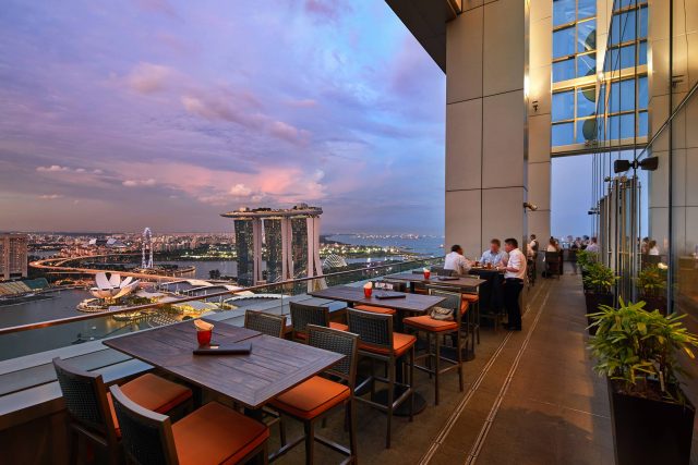 best rooftop restaurant in singapore level 33 outdoor patio evening sky