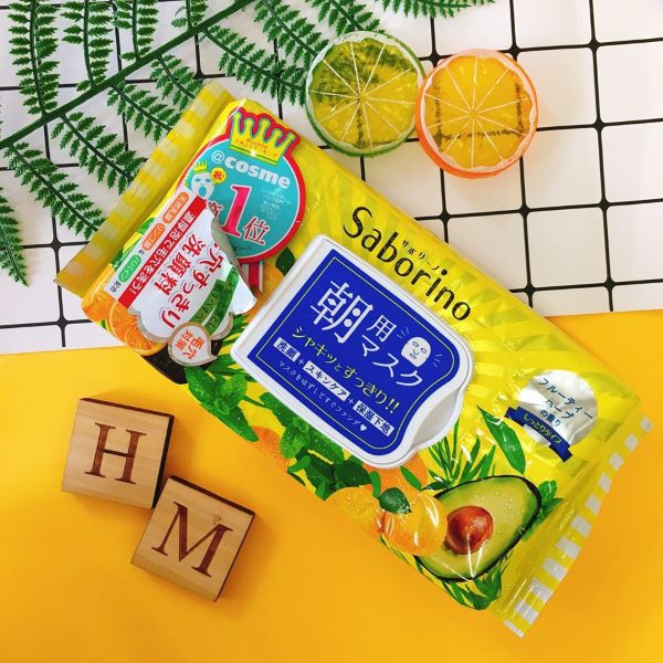 flatlay of saborino morning face mask against yellow background