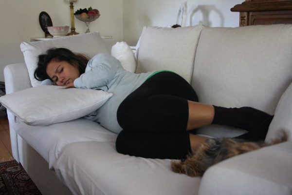pregnant woman new mum sleeping nap couch