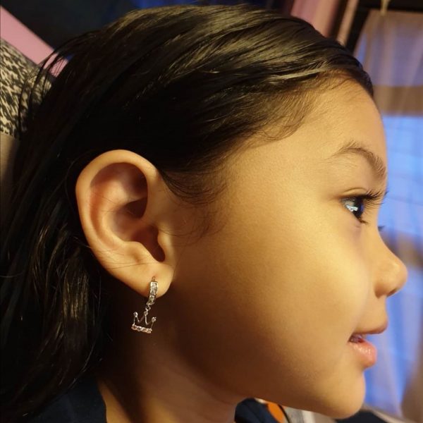 ear piercing for kids cherisheart girl with crown earrings home service