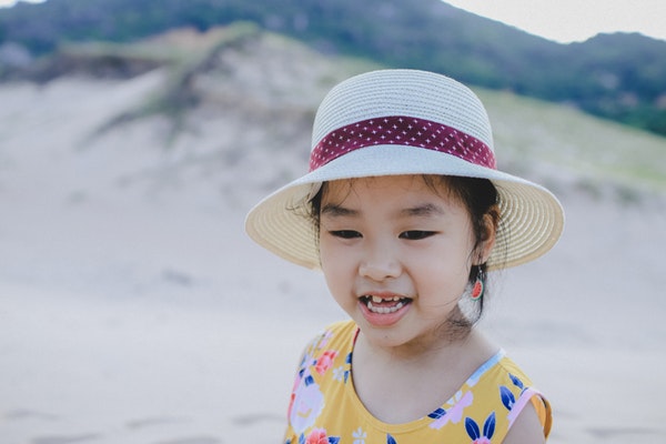 ear piercing for kids method singapore girl with watermelon earrings