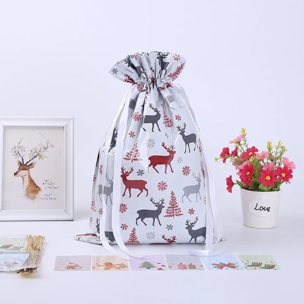 white christmas gift bag with reindeer prints