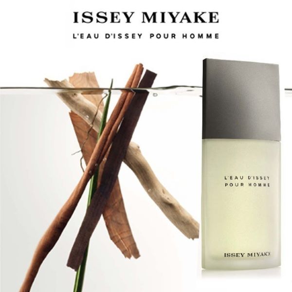 issey miyake perfume submerged in water with woods