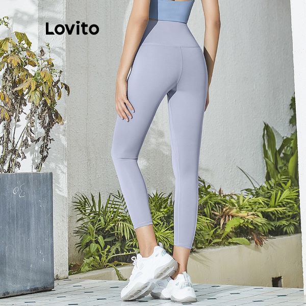 model wearing lovito leggings and white sneakers