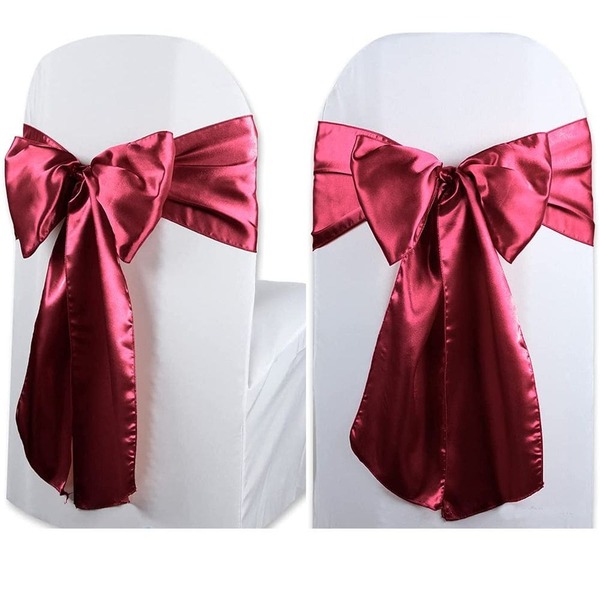 banquet chairs with maroon ribbon sash