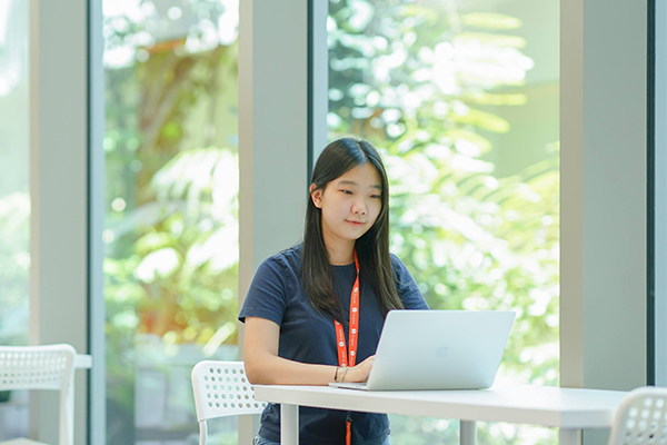 Poppy making use of the co-working space in Shopee