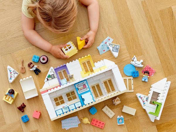 girl playing with lego duplo dollhouse set best