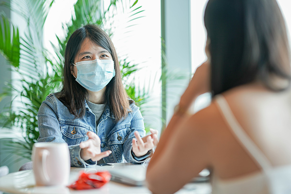 Yinghui in a casual meeting with a colleague