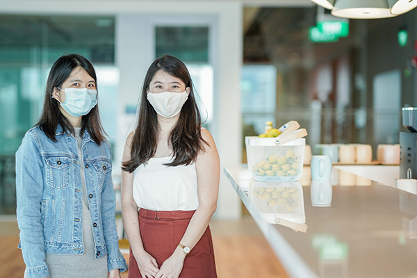 Yinghui (left) from the Shopee Marketing Solutions team and Kelly (right) from the Shopee Cross Border Operations Team