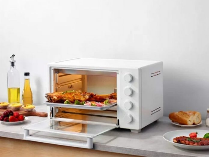 white microwave oven with grill rack and food
