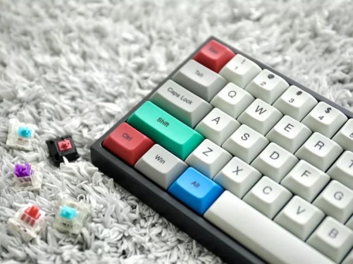 custom mechanical keyboard with green, blue and red keycaps
