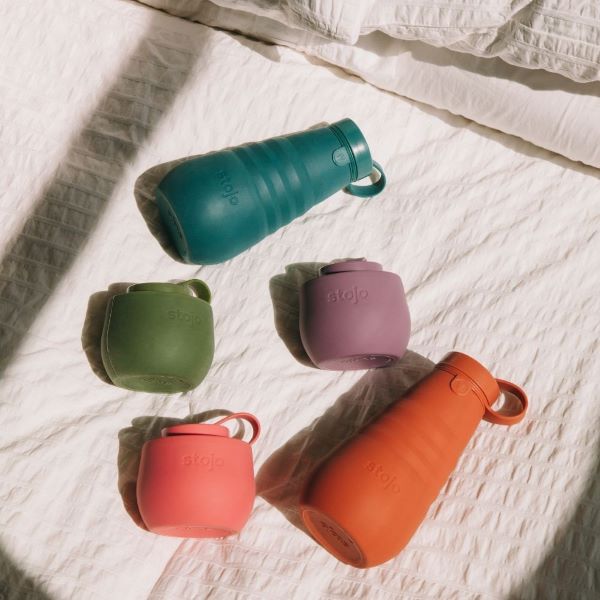 stojo collapsible bottles in blue, green, purple, pink and orange