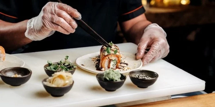 japanese chef preparing courses of sushi at the best omakase in singapore 2025