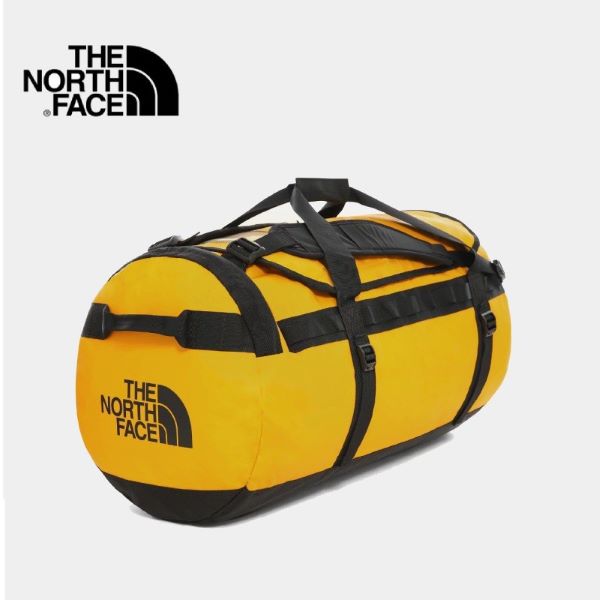 bright yellow the north face duffel bag