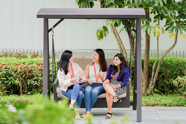 Joyce, Yi Ling and Suravi (left to right) having a casual catch up at the Shopee rooftop gardens