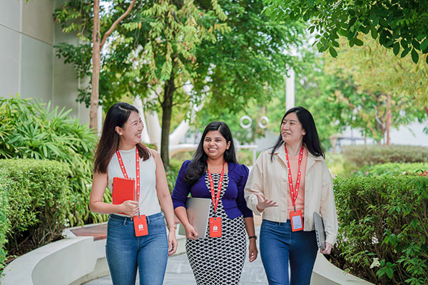 Yi Ling, Suravi and Joyce (left to right) taking a walk below the office