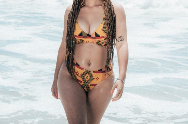 pear body shape curvy woman bikini yellow tribal