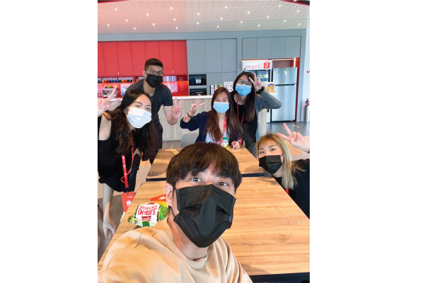 Janeil having a great time with his team in the Shopee cafeteria