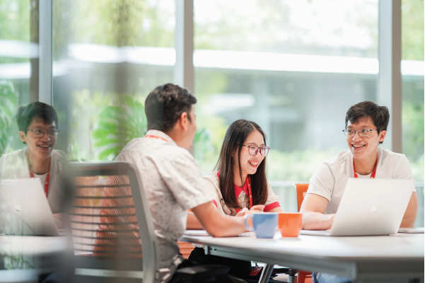 Our Promotion team engineers having a chat in our Shopee office meeting room