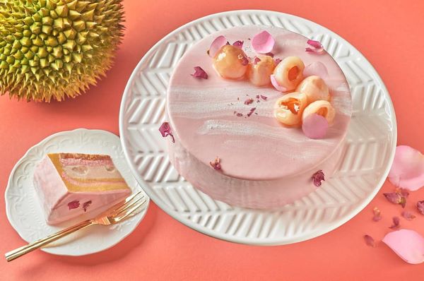 lychee durian cake with pink marbled glaze