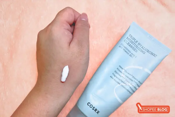 best facial cleansers singapore - CosRx Moisturizing Cleanser on hand