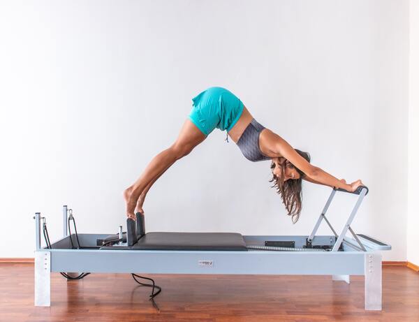 woman practicing at the best pilates studio singapore