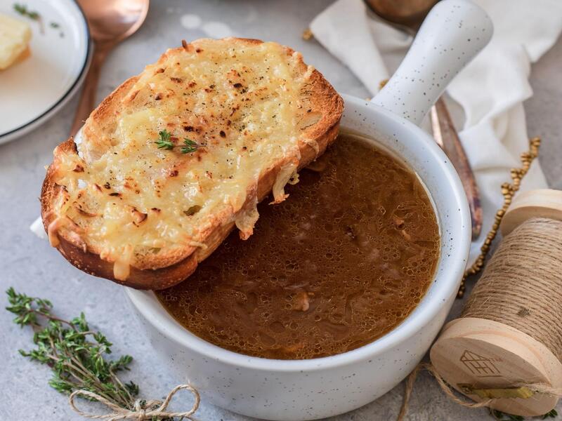 french onion soup recipe topped with cheese bread