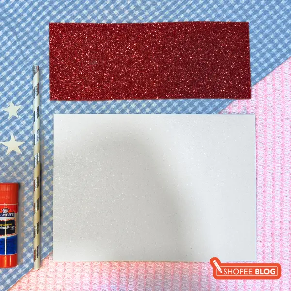 singapore flag craft - two pieces of paper in red and white.