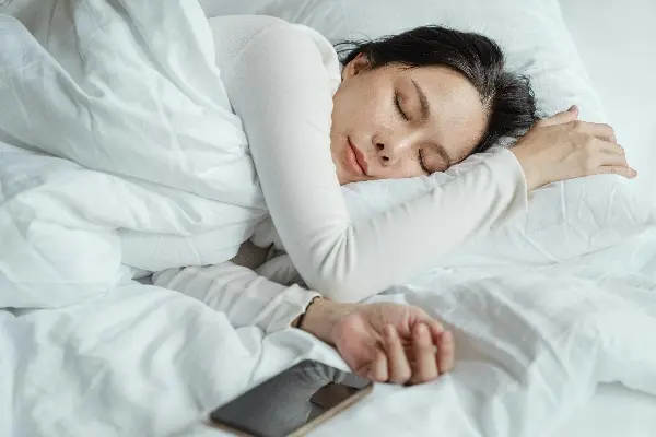 woman sleeping best pillows for neck pain singapore