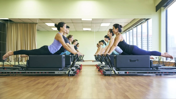 students enjoying a class at focus, one of the best pilates studio in singapore