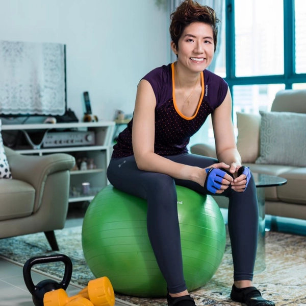 Karen Lee Fitness instructor posing on the exercise ball