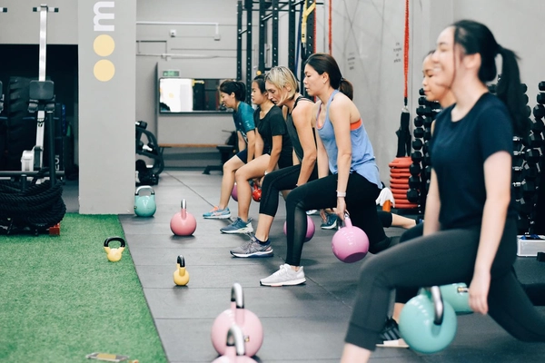 group kettlebell workout classes at Oompf Fitness