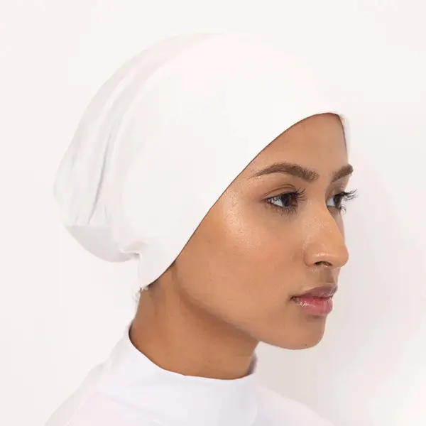 Simple hijab style for heart-shaped faces: Criss-cross turban style