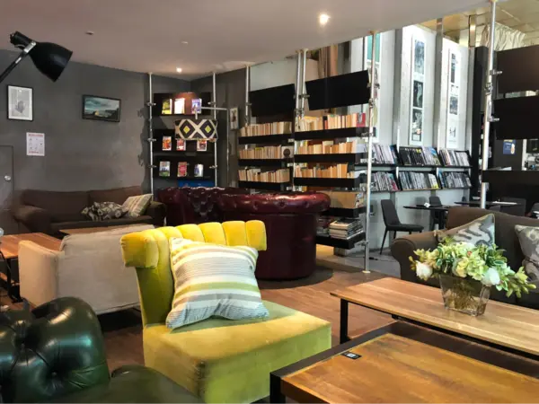 places to chill in singapore: The Book Cafe spacious interior with vintage furniture