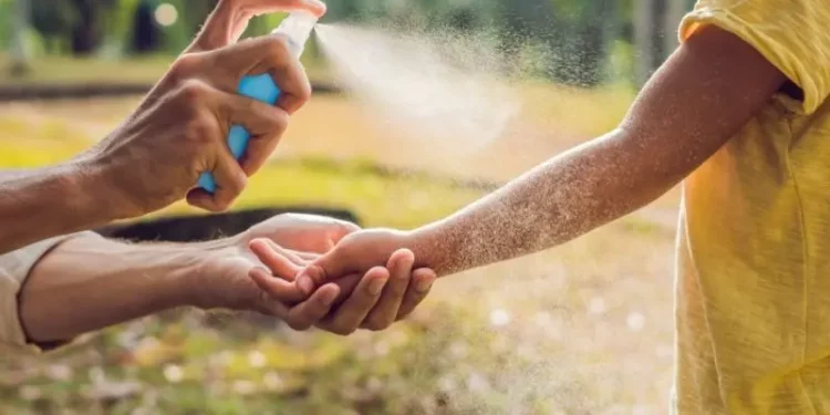 spraying the best mosquito repellent singapore