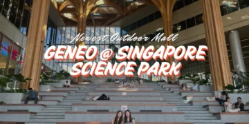 Geneo Science Park - two girls sitting on the flight of stairs at The Canopy