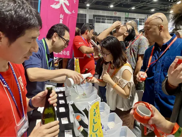 testing beverages at the Sake Festival Singapore 2025