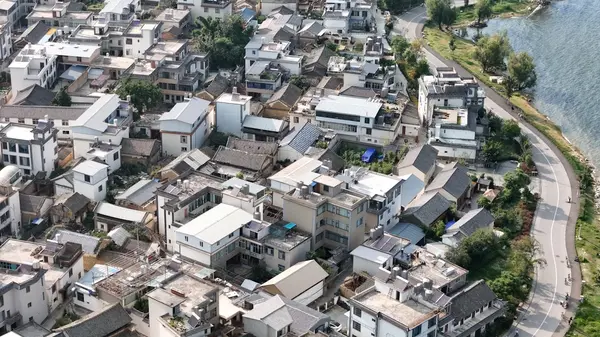 visit yunnan's Shuanglang Ancient Town as you drive along the scenic routes