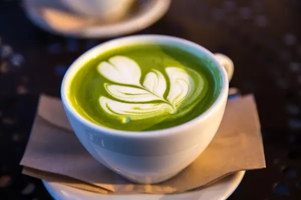 serving hot matcha at the best home cafes in singapore
