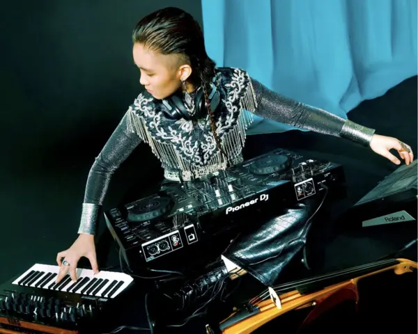 Belle Sisoski with musical instruments