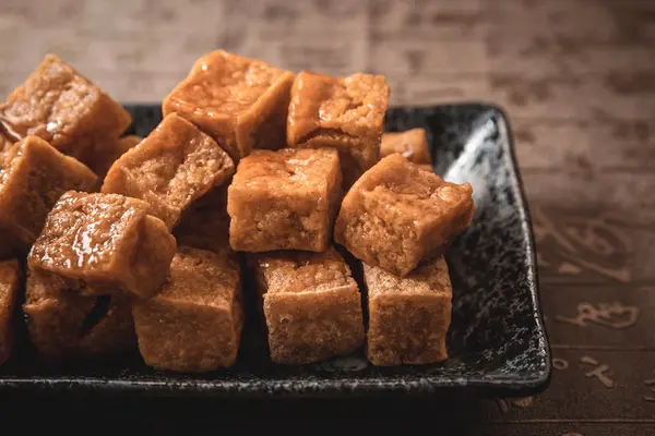 Local flavours in Zhujiajiao, feauturing a plate of smelly tofu