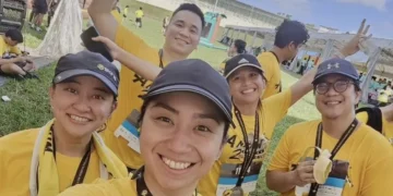 Joanna and her group of friends after a running event in Singapore