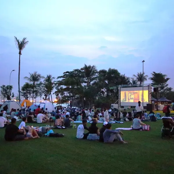 Watch a family-friendly film by the beach